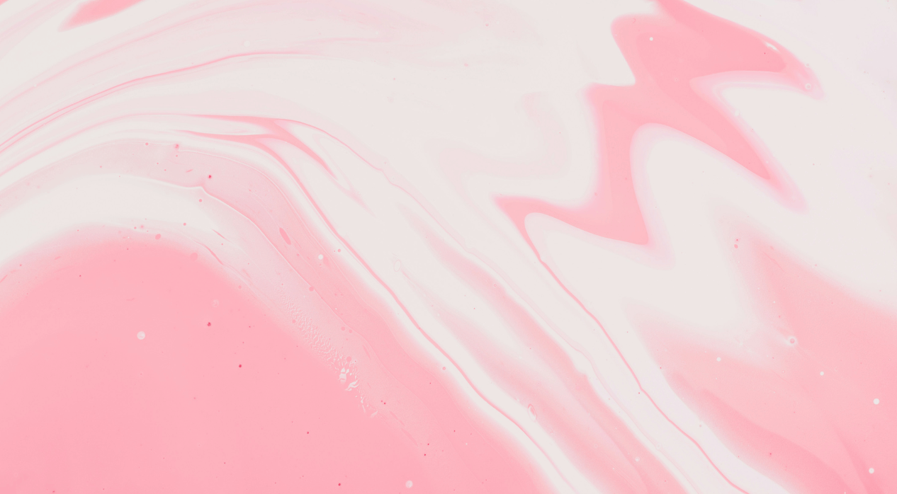 bstract pink and white marbled pattern with swirling shapes and small specks.