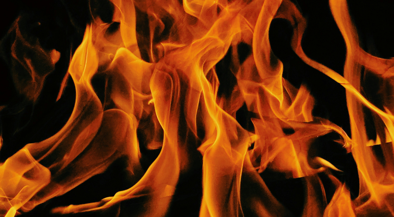 flames in front of a black background