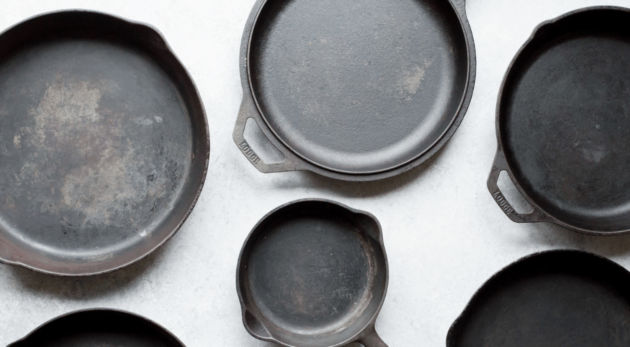 iron skillets on white background