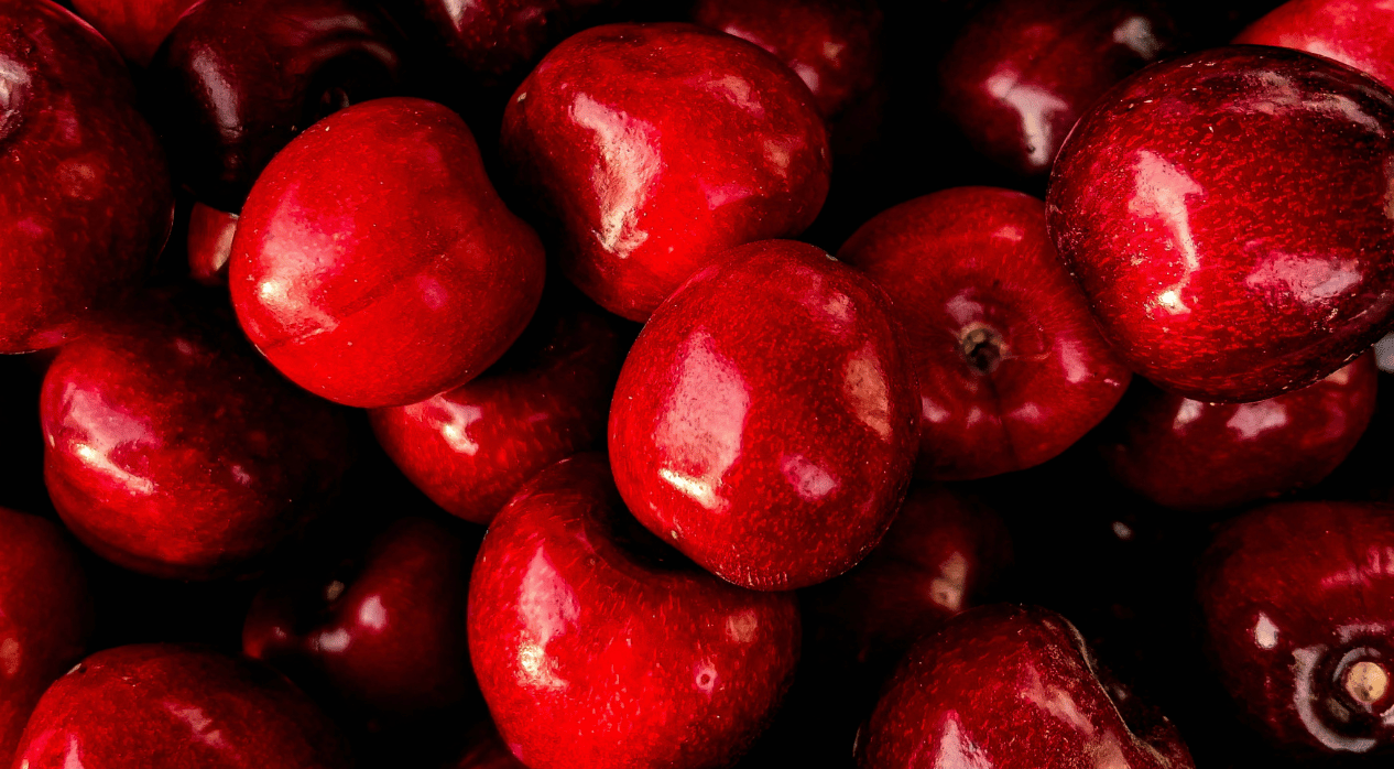 A batch of red cherries without the stem